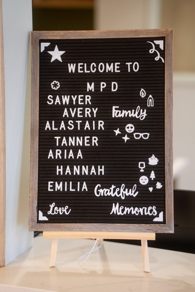Welcome sign with names and decorative elements