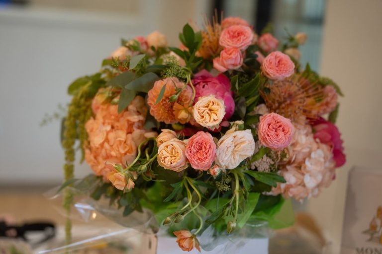 Colorful bouquet with roses and peonies in vase